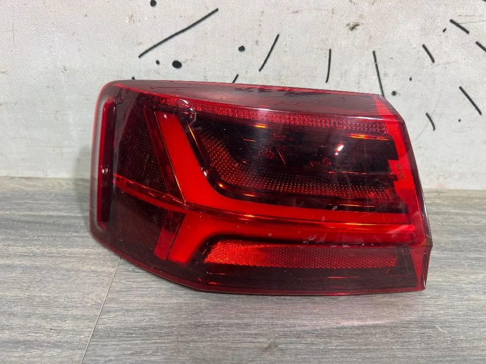 Фонарь задний наружный левый Audi A6 C7 рестайлинг (2014—2018), фото 1