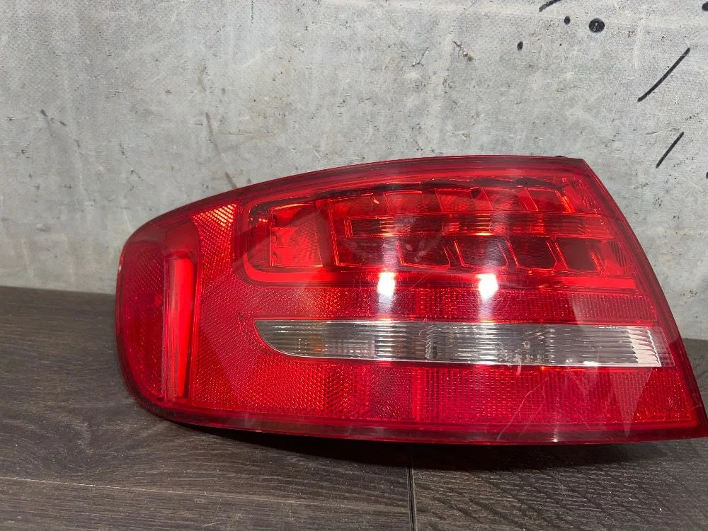 Фонарь задний наружный левый Audi A4 B8 (2007—2012), фото 1